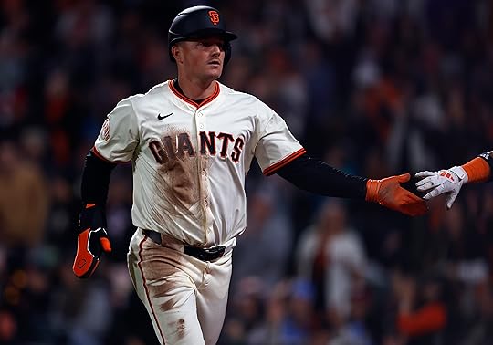 San Francisco Giants’ Matt Chapman (26) high-fives a teammate after...