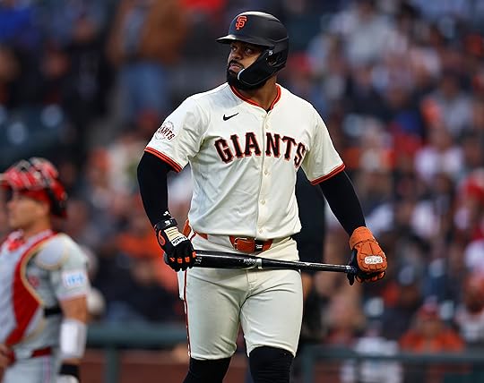 San Francisco Giants’ Heliot Ramos (17) heads to the dugout...