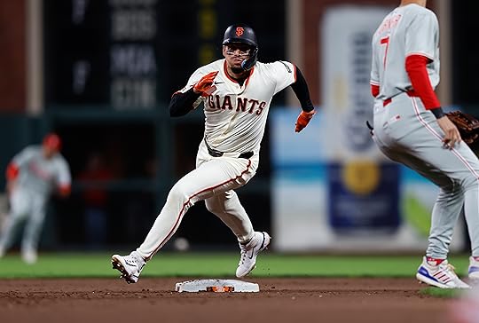 San Francisco Giants’ Willy Adames (2) rounds second base on...
