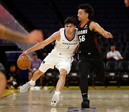 Golden State Warriors’ Taran Armstrong (1) dribbles against Miami Heat’s...
