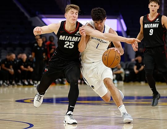 Golden State Warriors’ Taran Armstrong (1) dribbles against Miami Heat’s...