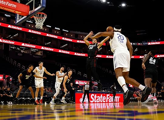 Miami Heat’s Marcus Williams (56) grabs a rebound against the...