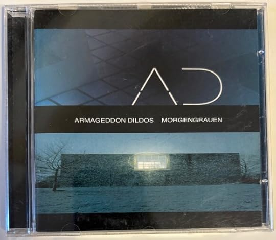 Cover art is blue tinted, so mostly blue and black. It shows the side of a stone house, with a big window and a lens flare coming from the window. There are leafless tress on either side of the house. There doesn't look to be a roof.