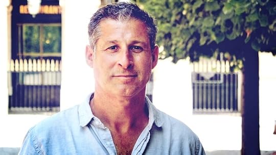 Photo of Chris Pavone, author of this book about an apartment building like the Dakota. Billionaires live there.