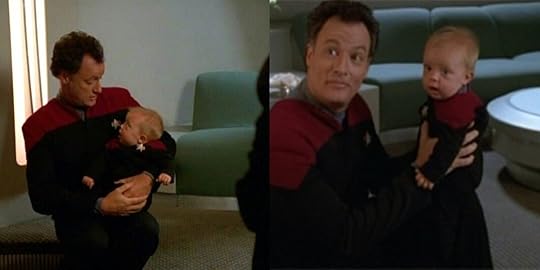 Q (John de Lancie) hold his infant son in the Voyager episode "The Q and the Grey." 
