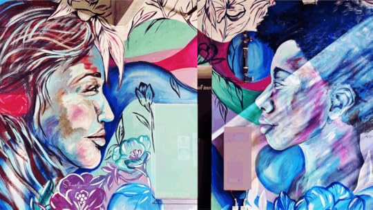 wall art employees respectfully looking at each other in mentoring relationship