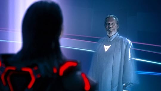 A smiling bearded Jeff Bridges in a glowing white tunic in Tron: Ares