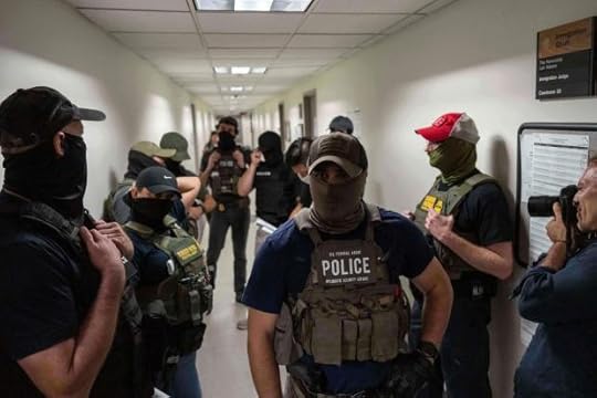 Federal agents stand outside immigration court at the Jacob K. Javits Federal Building, Wednesday, July 16, 2025, in New York. (AP Photo/Yuki Iwamura)