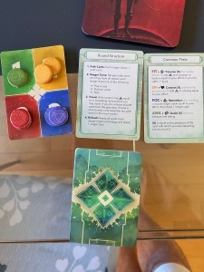 Some of the cards and tokens of the game.