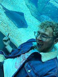Author Jackson Dickert with a manta ray