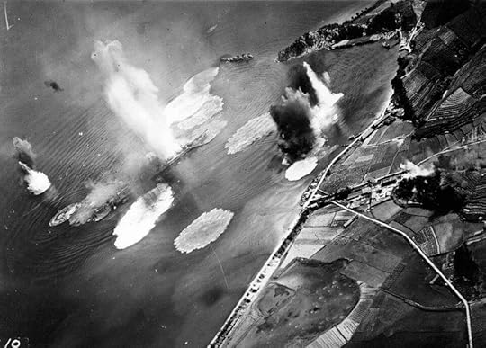 Japanese cruiser Tone under air attack near Kure, Japan, 24 Jul 1945; photo taken by USS Shangri-La aircraft (US National Archives: 80-G-490147)