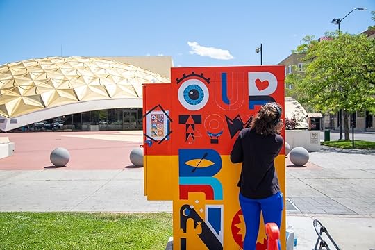 artist working on art in downtown reno