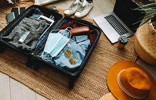 packing-light-person-packing-suitcase