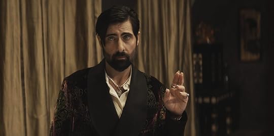 Jason Schwartzman holding up two fingers together on Talamasca: The Secret Order