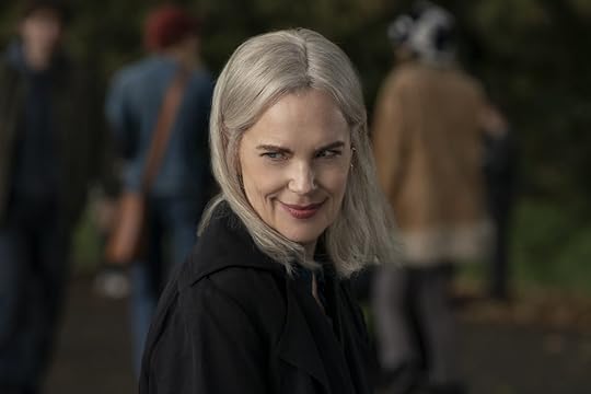 A white-haired woman smirks on Talamasca: The Secret Order