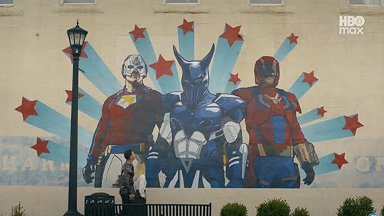 A mural on the wall of Peacemaker in the happy universe.