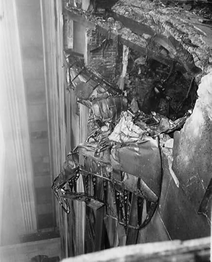 Wreckage of the B-25 that crashed into the Empire State Building, 28 Jul 1945 (Acme Newspictures, public domain via Wikipedia)