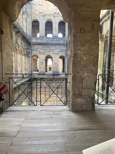 Upper floor windows looking across the Porta Nigra courtyard. 