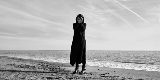 Photo by Engin Akyurt: https://www.pexels.com/photo/woman-standing-at-the-beach-2174621/