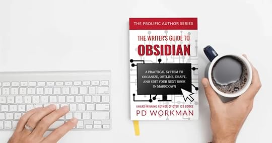 clean desk with The Writer's Guide to Obsidian on display