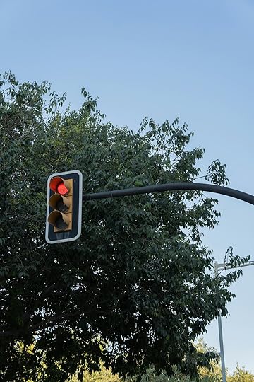 a stop light with a red light