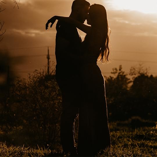 couple embracing in the sunset