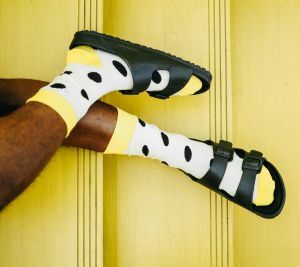 dotted socks and black sandals