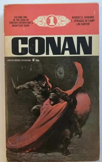 Paperback book. Shows Conan fighting a gorilla with a flowing red cape.