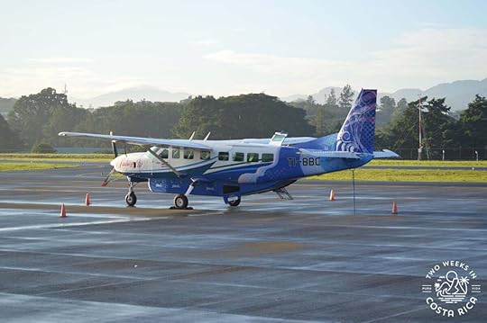a domestic plane on an airstrip in costa rica