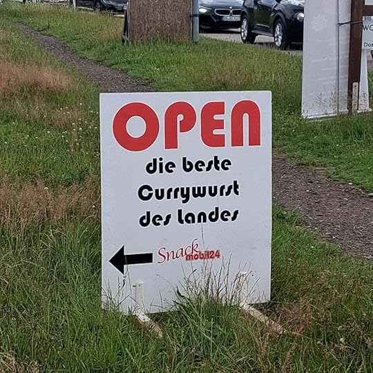 A signing advertising, in German, the best currywurst