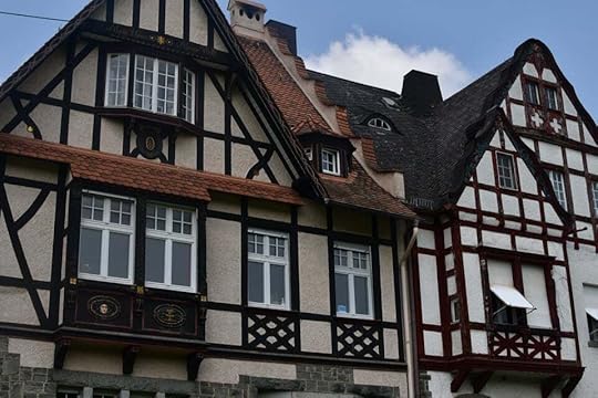 A pair of striking European houses.