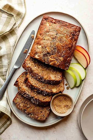 apple zucchini bread cut into slices on platter.