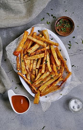 top shot of yuca fries with red dip