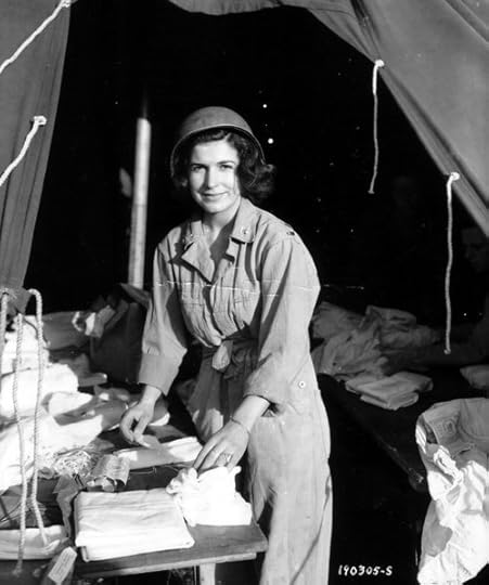 US Army nurse preparing dressings, 15 June 1944, 13th Field Hospital, St.-Laurent-sur-Mer, Normandy (US National Archives: 190305-S)