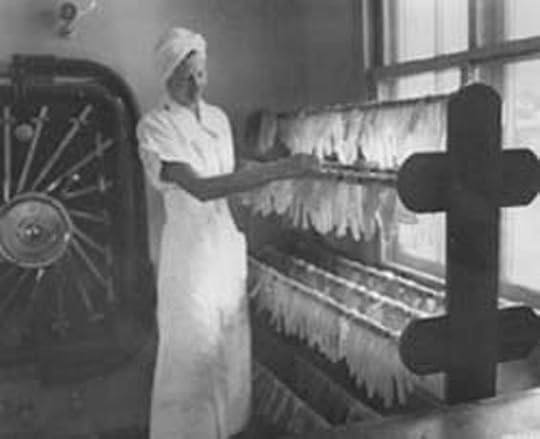 Army Nurse Bernice Simmet selects a pair of rubber gloves, Fort Benning GA, 20 July 1941 (US Army Medical Department, Office of Medical History)