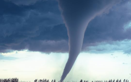 a black tornado racing across the plains