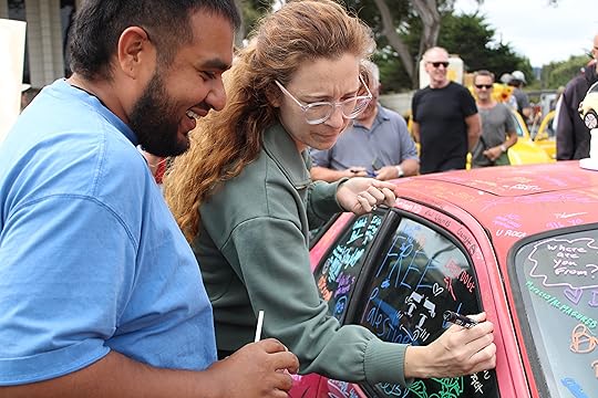 Guests took turns signing a 1986 Porsche 944 Turbo from...