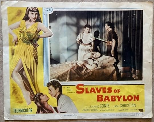 Horizontal lobby card. There is a picture from a scene from the film, showing a man sleeping and two men above him holding swords. Around this is an L-shaped yellow border with a woman in a yellow dress standing and showing her bare leg. At the bottom is a woman and a man in an embrace. It says 