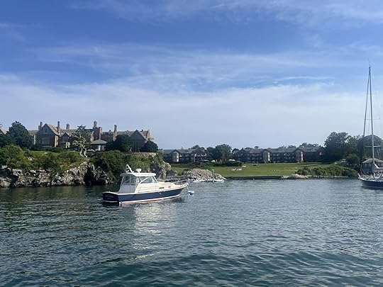 boat in front of mansion in newport, rhode island