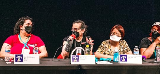 four panelists speaking about erotica and horror