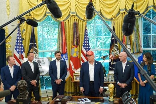 President Donald Trump speaks with reporters as Homeland Security Secretary Kristi Noem, from right, FIFA President Gianni Infantino, Vice President JD Vance, Richard Grenell, president of the Kennedy Center Board of Trustees and Andrew Giuliani listen in the Oval Office of the White House, Friday, Aug. 22, 2025, in Washington. (AP Photo/Jacquelyn Martin)