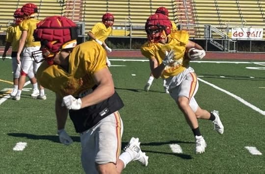 Floyd Smith follows blocker Garrett Kuska for Pacific Grove during practice. (John Devine -- Monterey Herald)