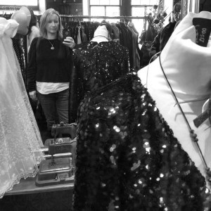 Ailish among vintage clothes!