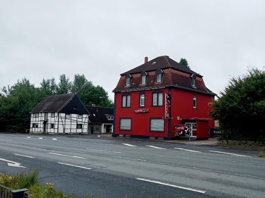 Timbered house and Club A1 brothel