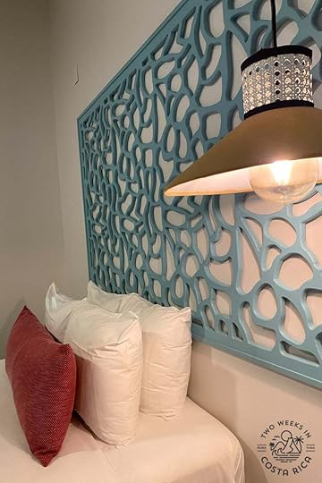 a contemporary bedframe and lamp at hotel cloud forest lodge