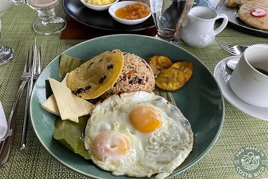 a plate with eggs and rice and beans