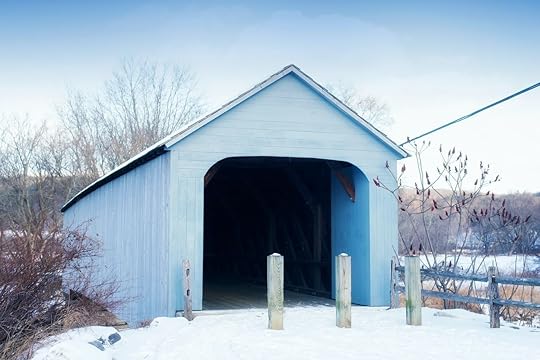 The white Upper Sheffield covered bridge in Massachusetts is for foot traffic only