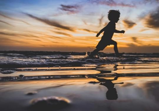 A child running across the sand in joy. Today is another day here, and that’s good.