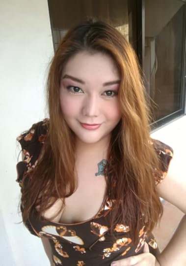 Lilly Lustwood, founder of FindFemboys.com and bestselling feminization romance author