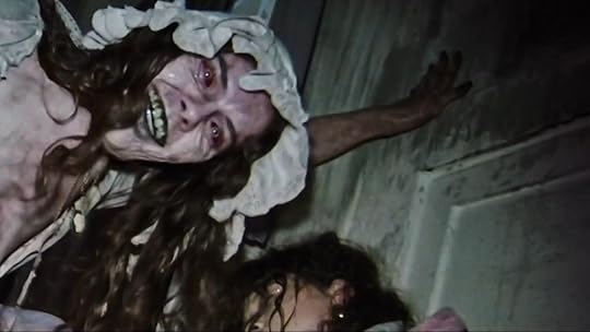 image of posessed woman with red eyes in v/h/s/halloween trailer